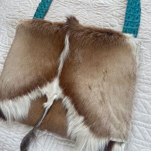 Fur bag with alligator strap